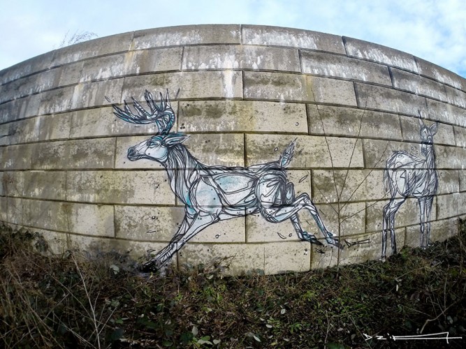 dibujo de ciervos en muro